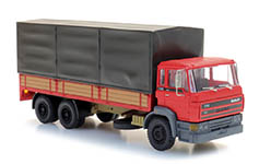 118-487.053.05 - H0 - DAF Kipp-Fahrerhaus Kab C, Tandemachse Pritschen-LKW mit Plane, rot